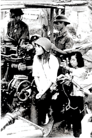 Jane Fonda with Hanoi gun crew in 1972